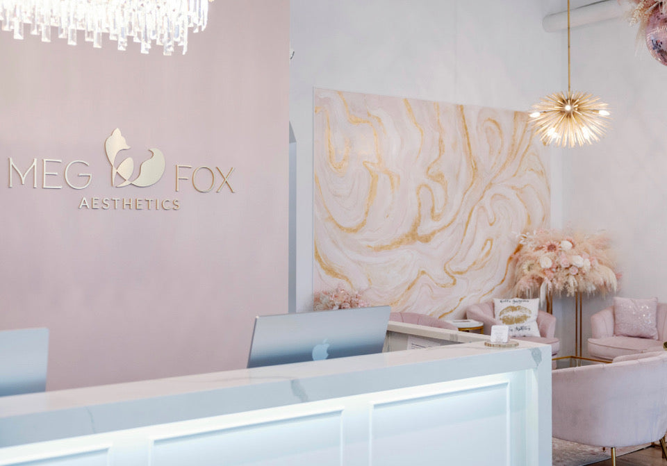 Clean, professional medical spa treatment room with neutral tones at Meg Fox Aesthetics in Towson